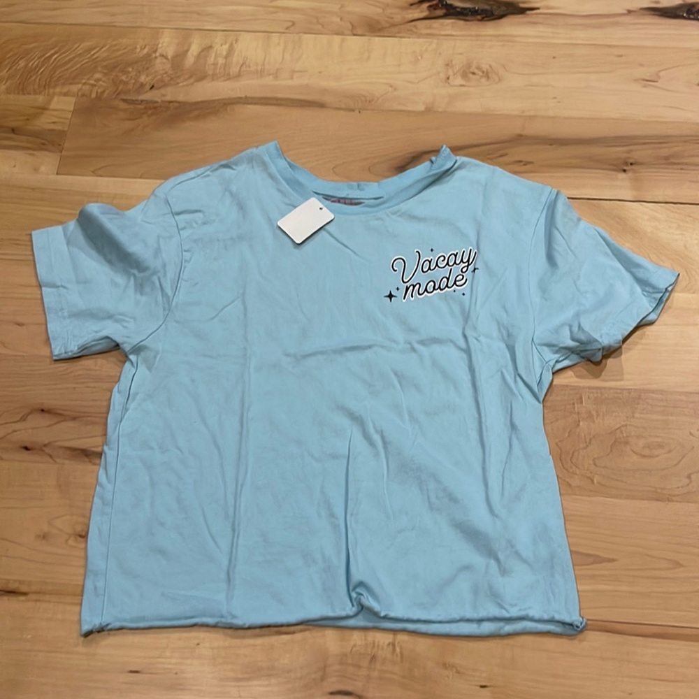 Blue “vacay mode” cropped top